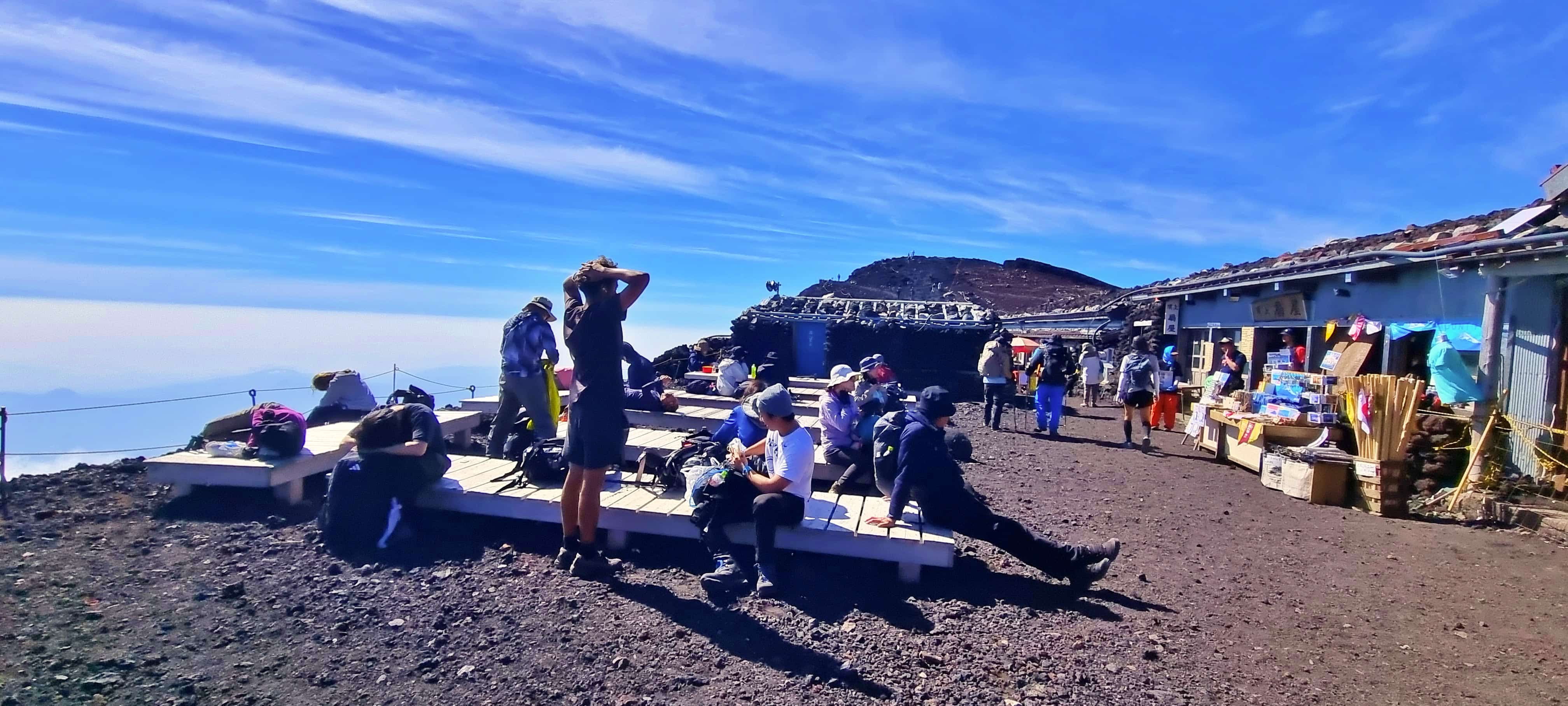 Climbers relaxing at Mt Fuji Summit