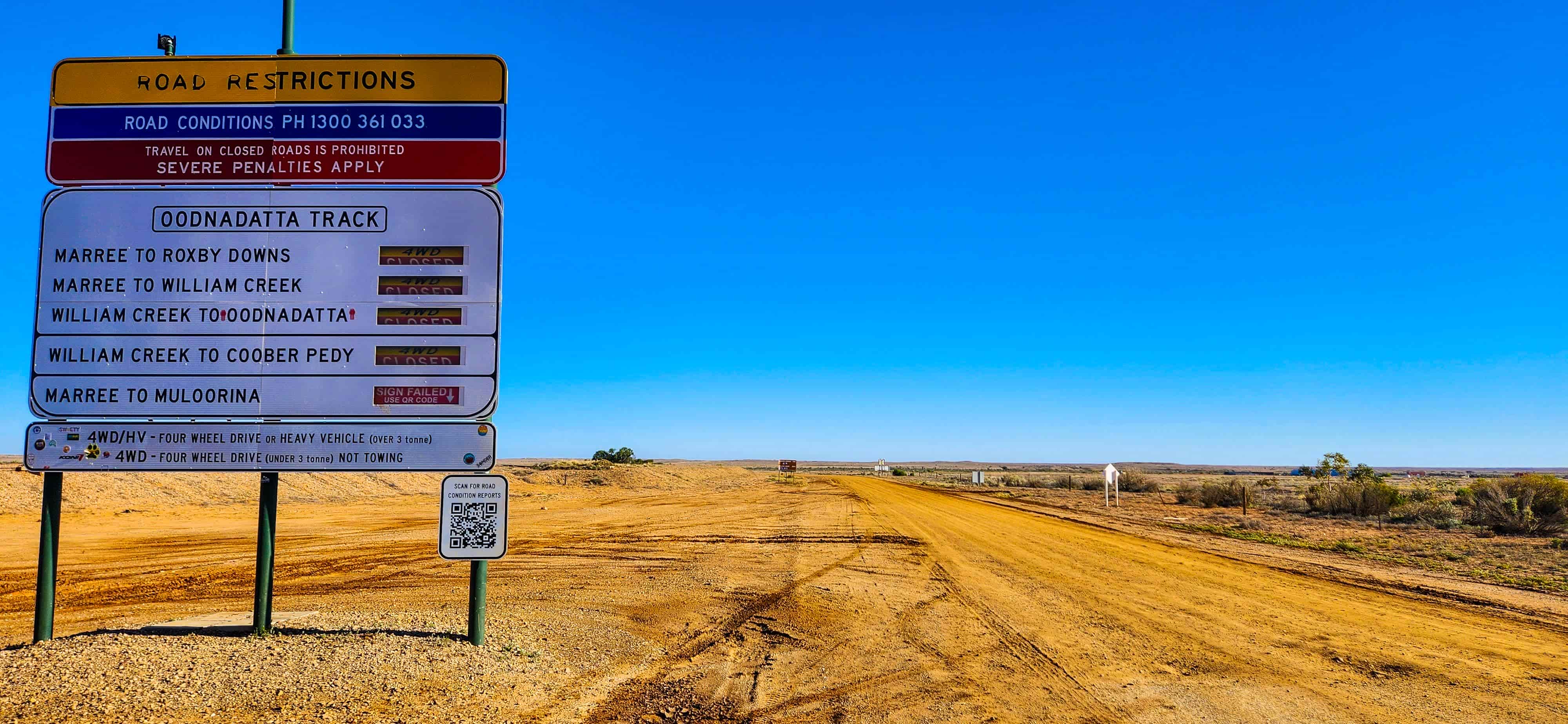Outback Road Conditions Sign