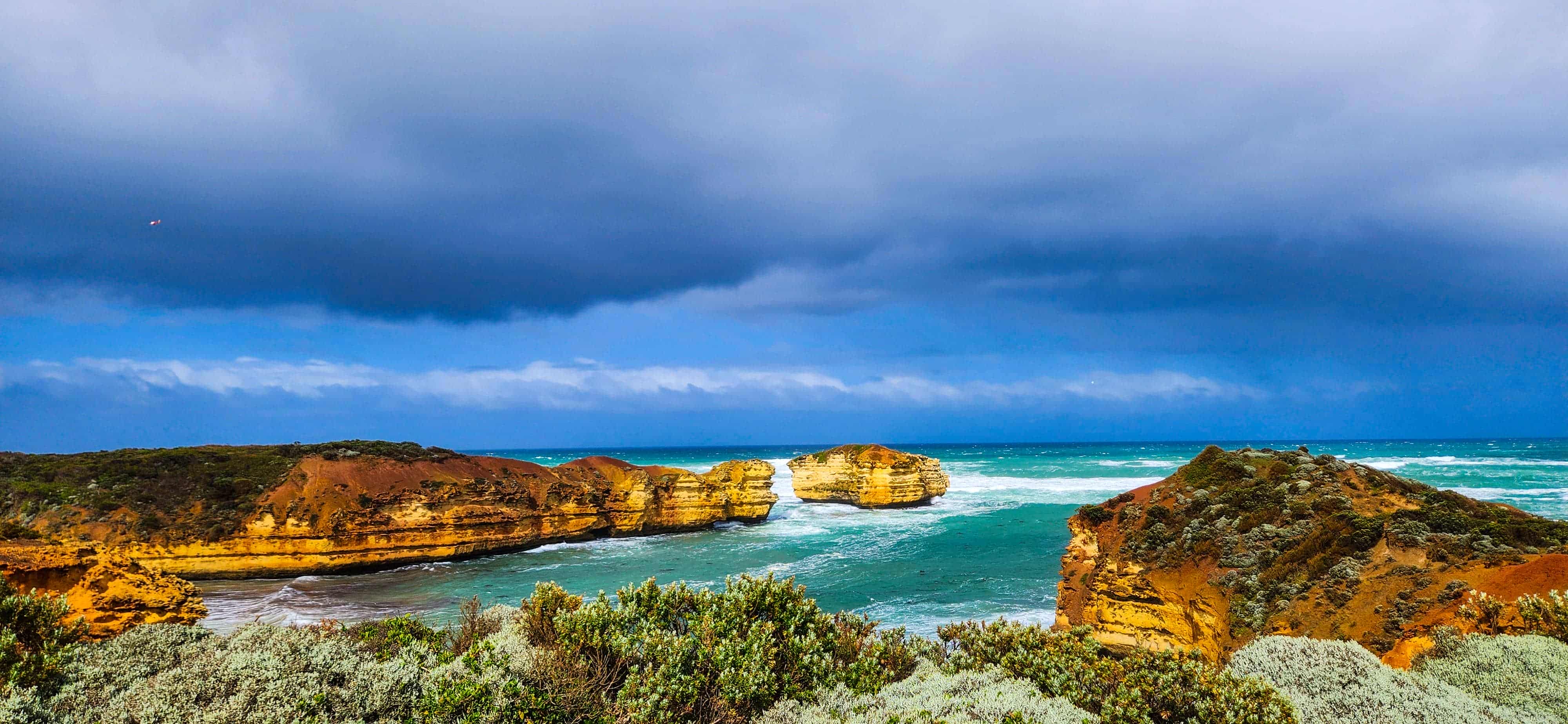 Views of Worm Bay along Cliff Top Walk at The Bay of Martyrs